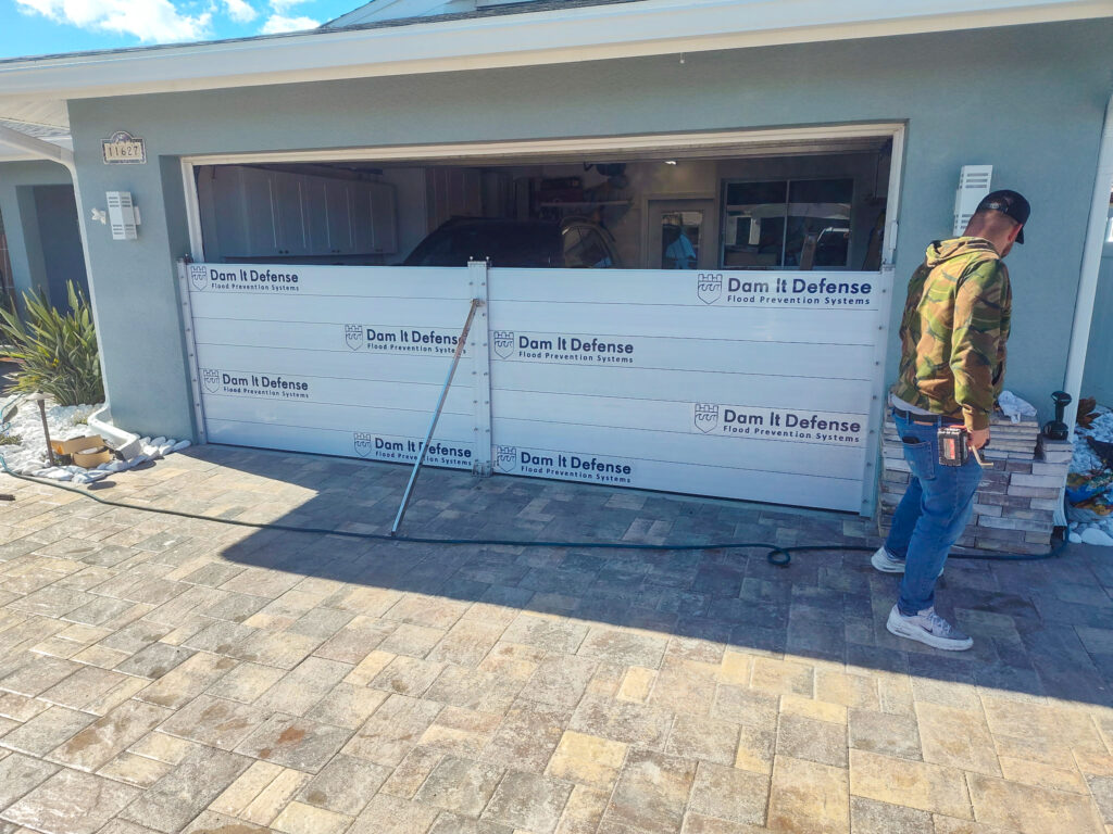 garage flood barrier system installed on residential home in St Petersburg Florida hurricane flood protection