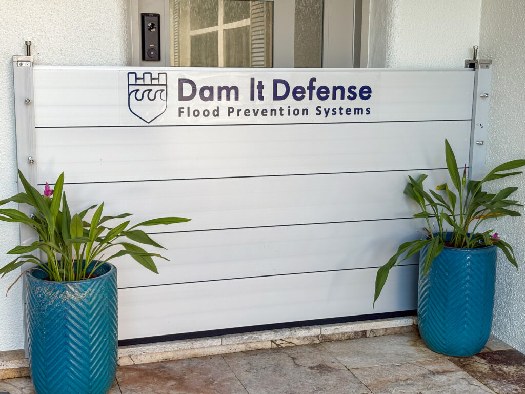 aluminum flood barrier system installed at home entryway flood protection system Florida