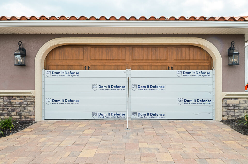 garage flood barrier system installed on residential home in St Petersburg Florida hurricane flood protection